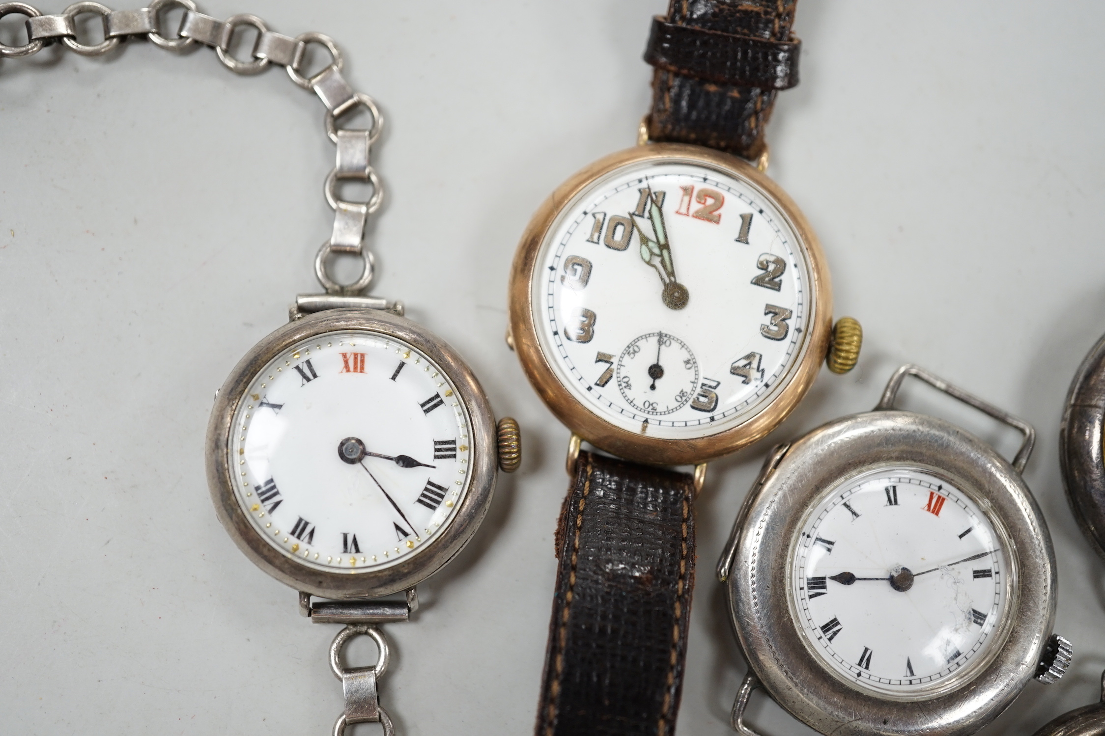 A gentleman's early 20th century 9ct gold manual wind wrist watch and six other wrist watches including silver.